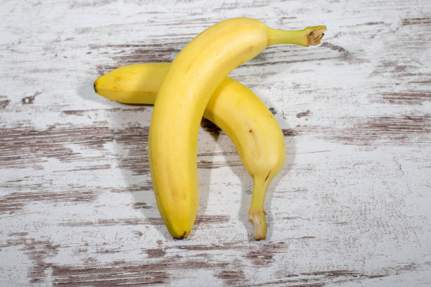 istock Bananas on background of vintage desktop. 842453504