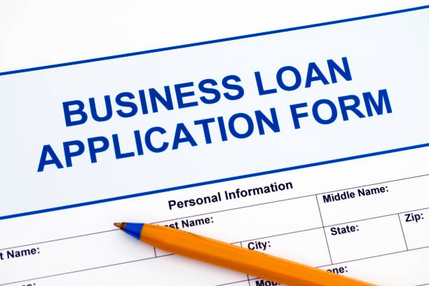 istock Business Loan Application Form with ballpoint pen. 842454506