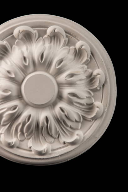 white plaster round outlet on a black background