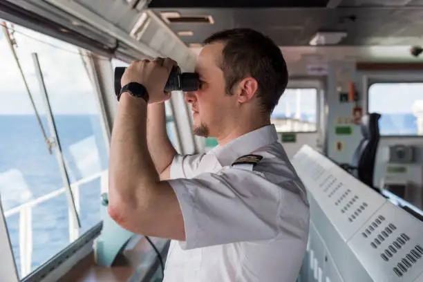 Photo of Senior Navigation Officer Navigating his Ship