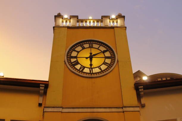 clock tower mall in sunset this shot is taken in Venice plaza Taguig Mc McKinley hills, taguig stock pictures, royalty-free photos & images