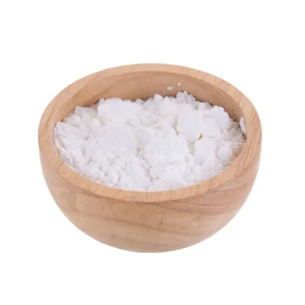 White Corn flour powder a popular food ingredient used in baking and for thickening sauces or soups isolated on white background