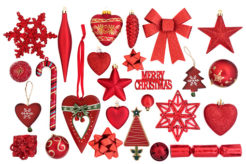 Red christmas bauble decorations and symbols on white background.