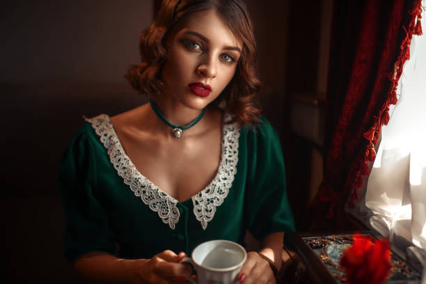 istock Woman travels on vintage train, rich compartment 842465266