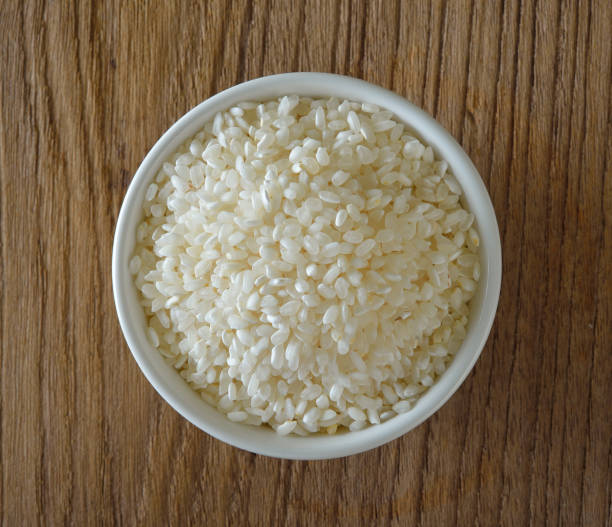 istock Japanese rice on wooden background 842467160