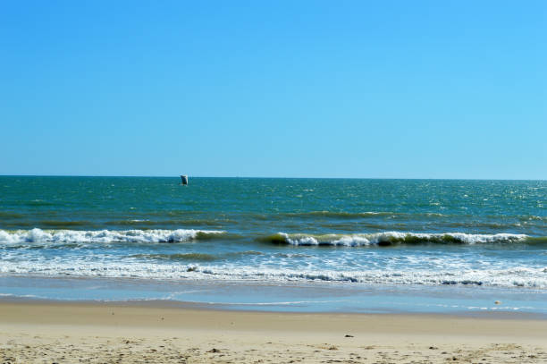istock Sailing boat on the horizon 842467234