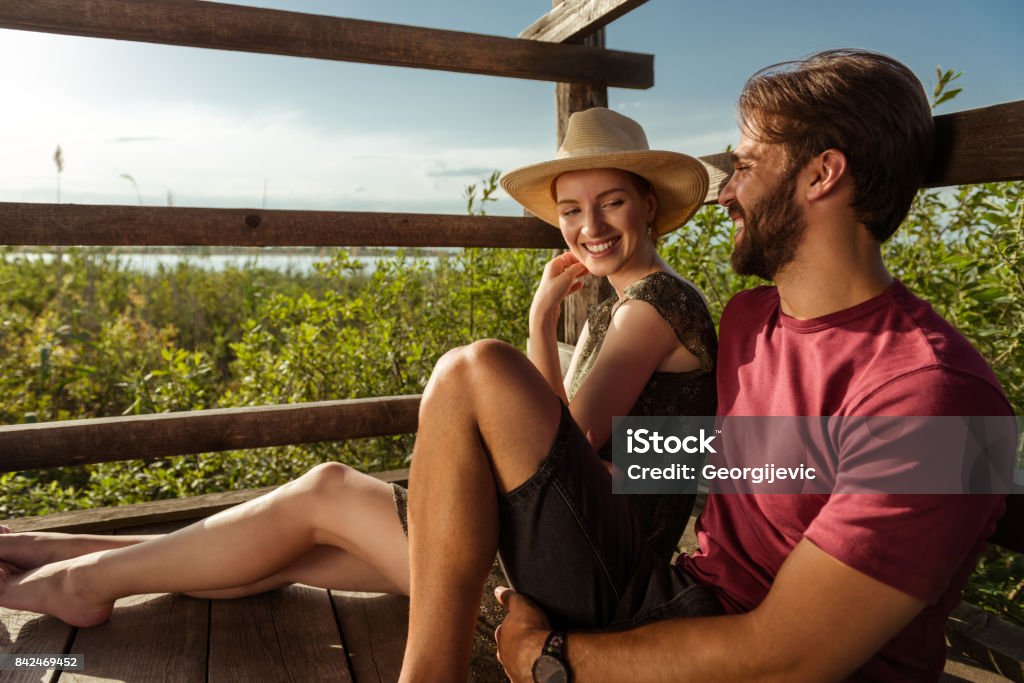 Perfect date time Happy couple relaxing outdoors and enjoying time together. Adult Stock Photo