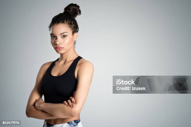 Fitness Young Woman In Sports Wear Studio Shot Stock Photo - Download Image Now - Teenager, Fashion Model, African-American Ethnicity