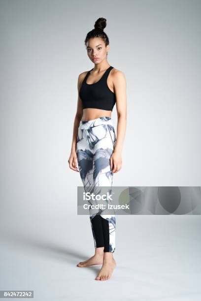 Cute Afro American Young Woman In Sports Wear Studio Shot Stock Photo - Download Image Now