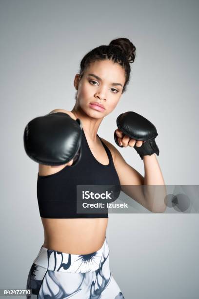 Attractive Fit Young Woman Boxing Studio Shot Stock Photo - Download Image Now - Boxing Glove, Teenager, 16-17 Years