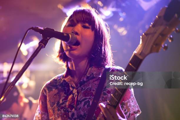 Woman Playing The Guitar Stock Photo - Download Image Now - Performance Group, Musician, Music