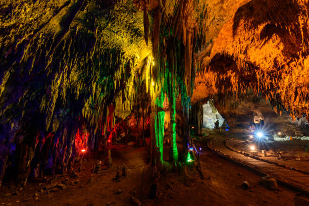 istock Stalactite stalactites with color lighting in cave 842474794