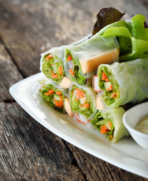 istock Salad roll on wooden background 842476234
