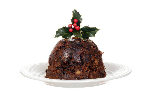 istock isolated christmas brandy pudding on plate with holly 842476714