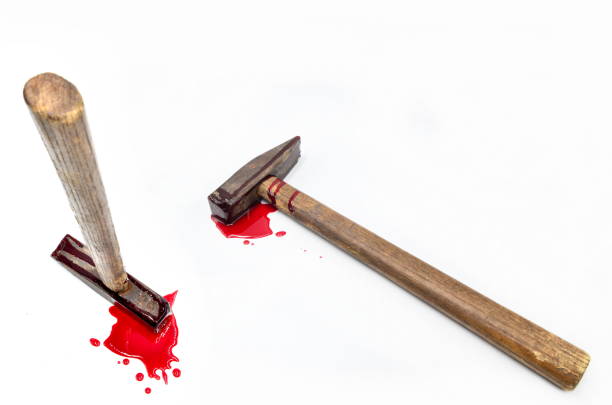 hammer with blood on white background stock photo