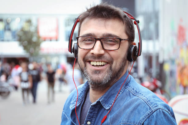 istock Man listen music in city 842478980