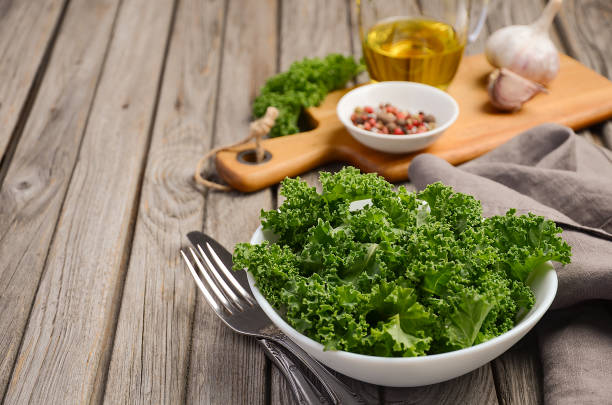 istock Fresh kale with olive oil, garlic and pepper 842479108