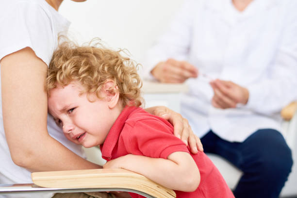istock Little Child Crying in Doctors Office 842481040