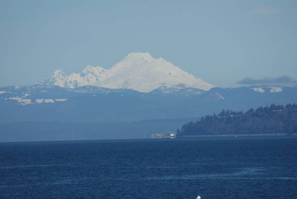 Mountain Picture I believe this is Mount Baker taken on a Washington State ferry headed to Kingston,WA everett washington state photos stock pictures, royalty-free photos & images