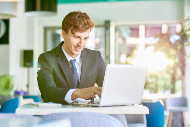 istock Elegant Businessman Working with Laptop 842481974