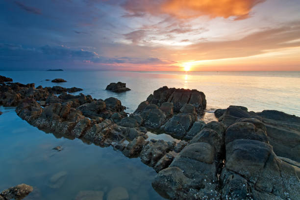 istock Beautiful Sunset on a Rocky Beach in Kota Kinabalu 842486930