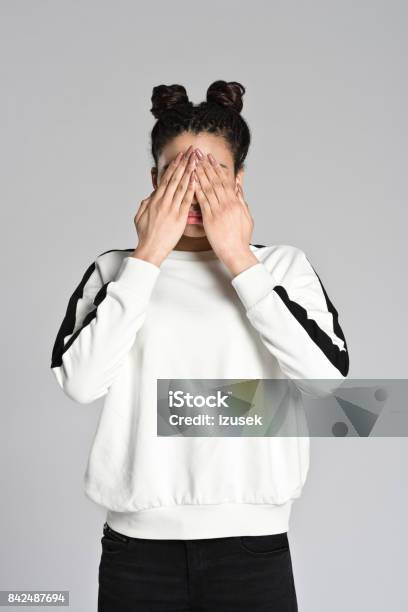 Afro American Teenager Woman Covering Eyes With Hands Stock Photo - Download Image Now
