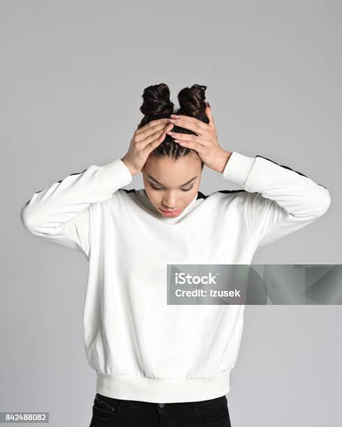 Worried Afro American Teenager Woman Stock Photo - Download Image Now - 16-17 Years, Contemplation, 18-19 Years