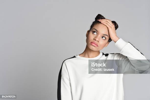 Portrait Of Afro American Teenager Woman Looking Up Stock Photo - Download Image Now