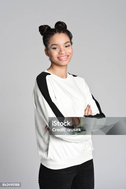 Happy Afro American Cute Teen Girl Stock Photo - Download Image Now - Teenager, African-American Ethnicity, Gray Background