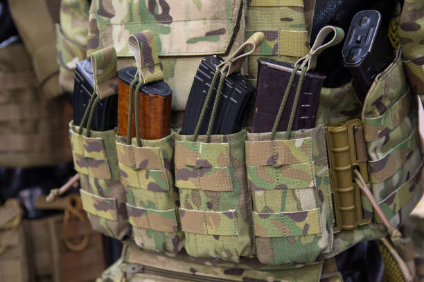 istock Pouches for ammunition closeup. Weapons and ammunition 842490382