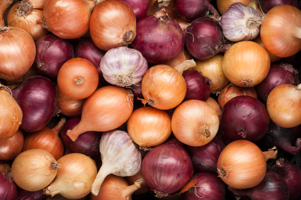 istock vegetables crop background onions garlic top view 842492538