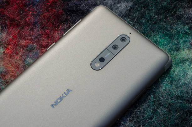 Nokia 8 Moscow, Russian Federation, September 1, 2017: Nokia Smartphone 8 close-up. The device lies on a warm house rug. phone nokia stock pictures, royalty-free photos & images