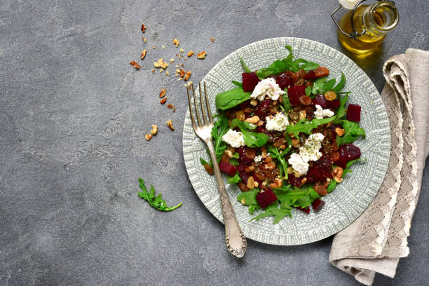 istock Warm beetroot salad with arugula,raisins and feta 842588732