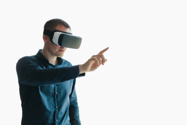 Young man with virtual reality glasses. The concept of future technology.