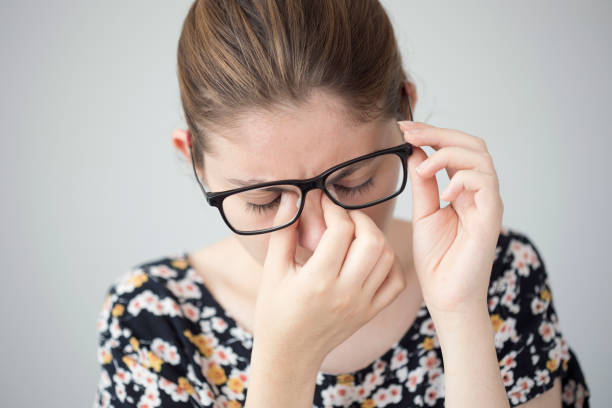 istock Young woman with eye fatigue 842596404