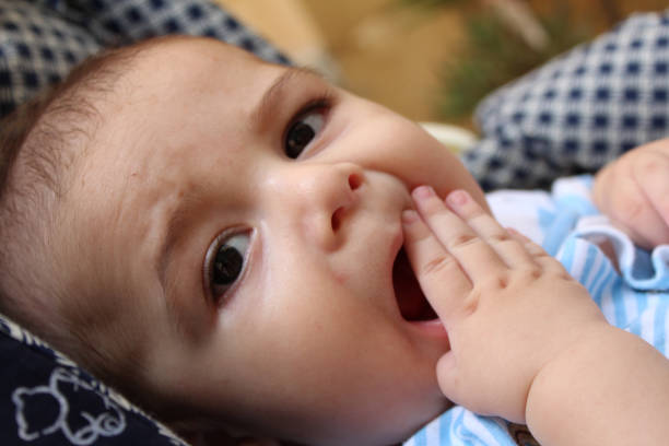 istock baby boy in pushchair 842602422