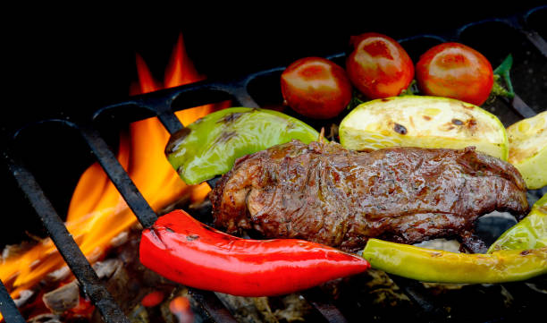 istock Grilled Beef steak with vegetable on the barbecue 842609140