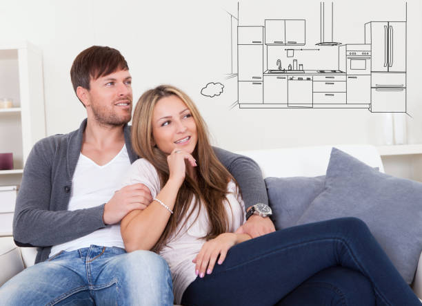 istock Cheerful young couple dreaming about the future 842609470