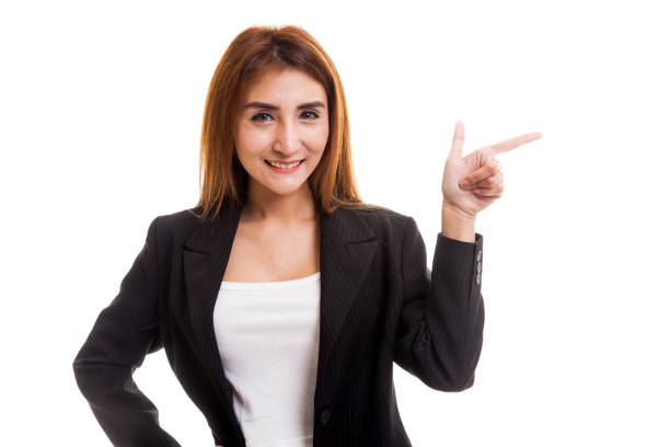 istock Young Asian woman smile and point. 842613796