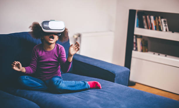 istock Cheerful girl with virtual reality goggles 842613874