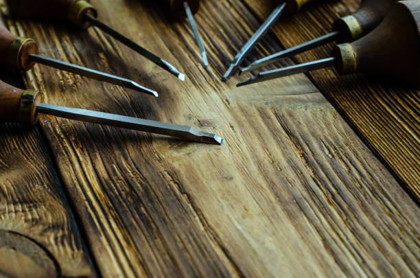istock Different gravers for jewelry on wooden background 842617522