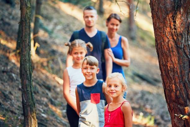 istock Family on the trip in forest 842626000