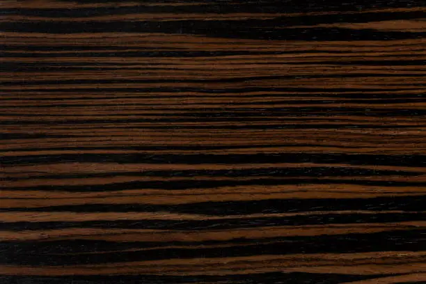 Photo of Dark ebony wood background