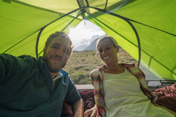 istock Young couple take selfie in tent 842635038