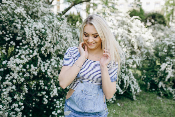 blonde girl in the summer park
