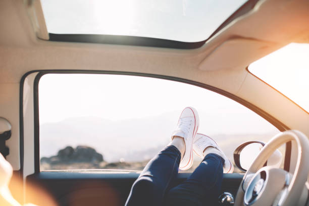 istock Happy woman resting in the car 842638532