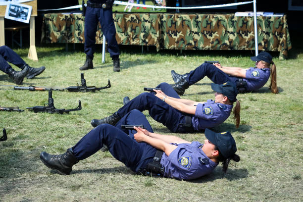 Zagreb, Croatia - May 28, 2017 : Police training exercise with handgun at 26th anniversary of the formation of the Croatian Armed Forces on Lake Jarun in Zagreb, Croatia.