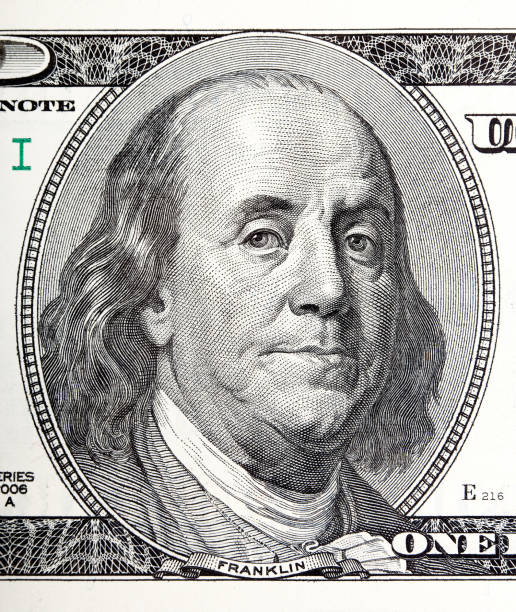 istock Portrait of Benjamin Franklin macro from 100 dollars bill 842642236