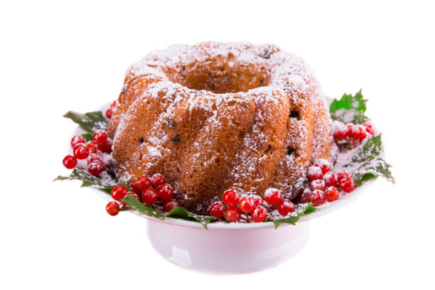 istock Christmas pudding with a berry of a viburnum on a white background 842642836