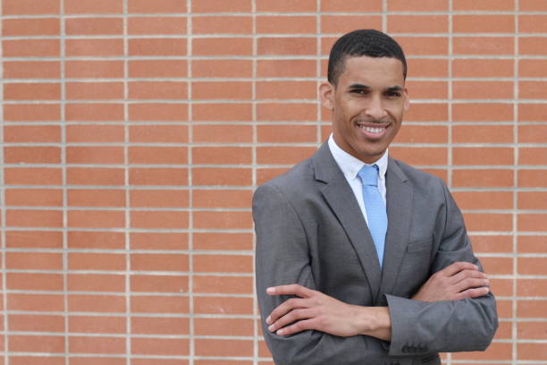 istock Business Man Smiling with Arms Crossed 842643724